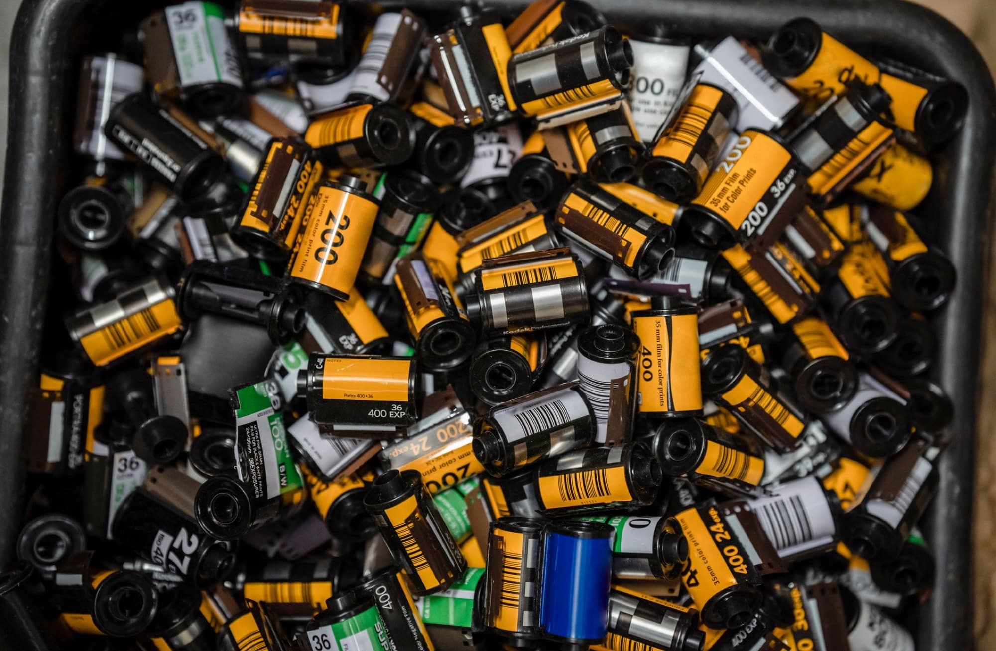 Stacked photographic film rolls.