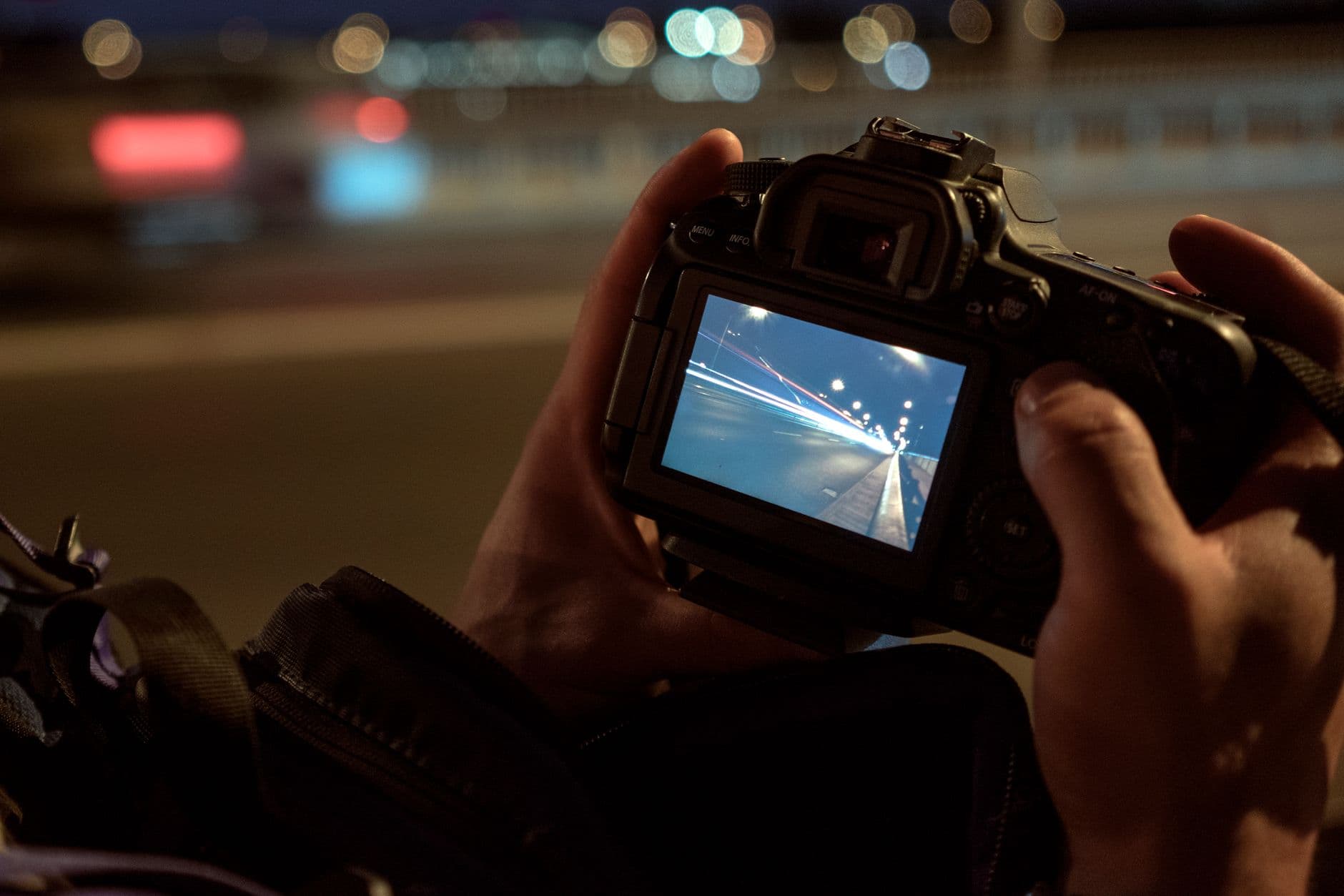 Camera screen showing a long-exposure night photograph.